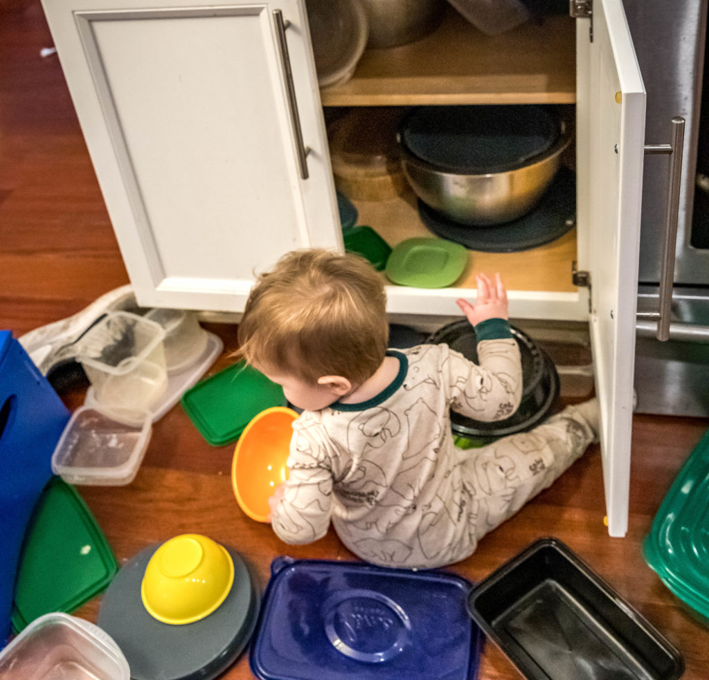 baby plays with pots and pans at home | working from home with a baby