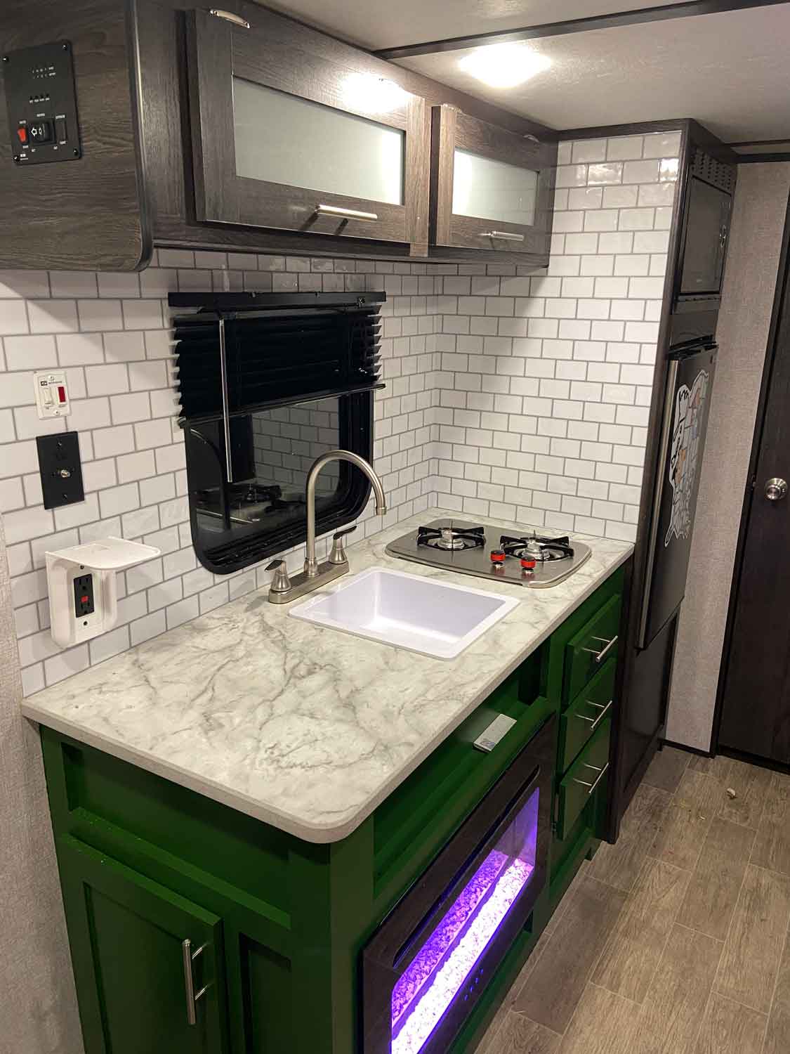 Brand new backsplash and painted cabinets