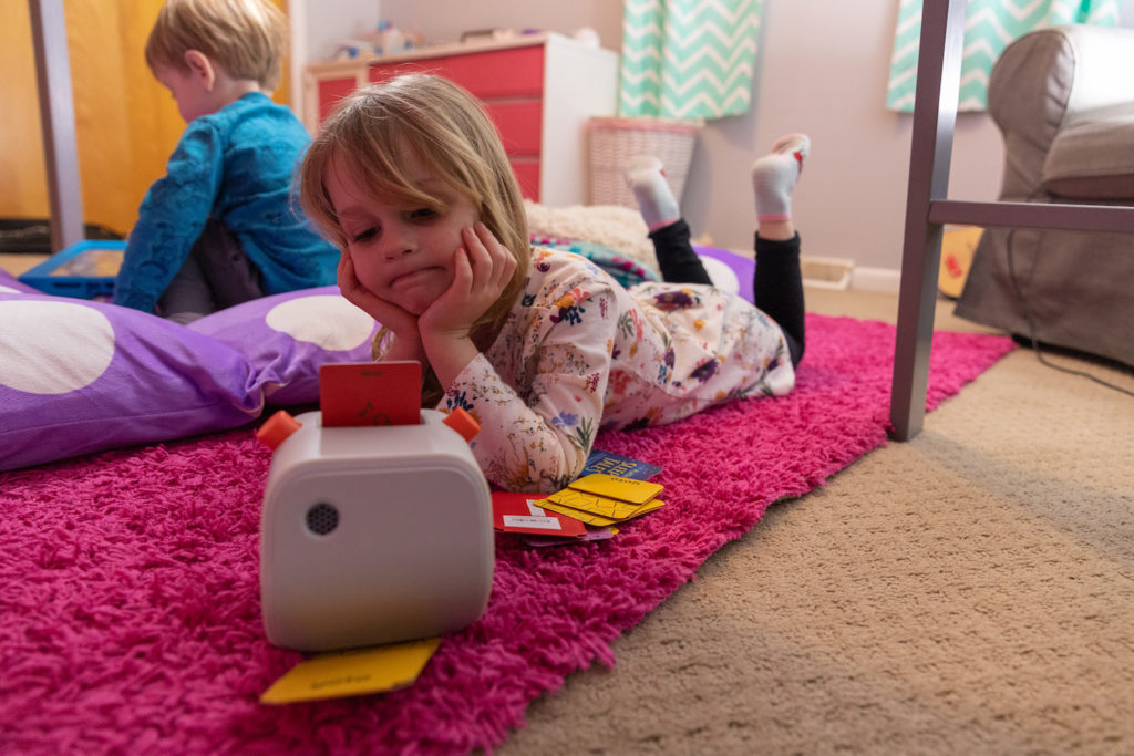 child lounging with music during quiet time