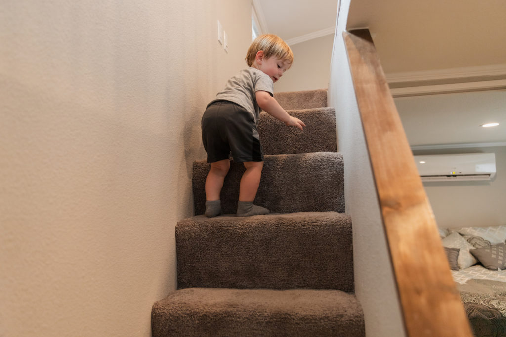 toddler running up stairs